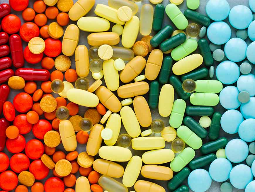 Medicijnen in kleuren van regenboog